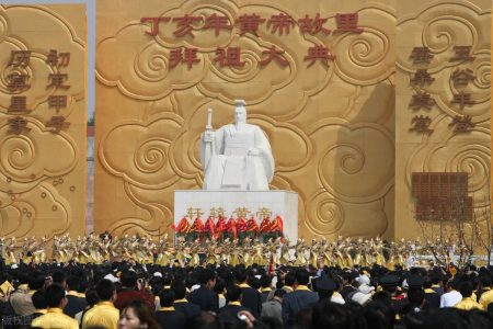 Officials and locals pay homage to the monument of Huang Di also known as the Yellow Emperor during a grand worship ceremony in Xinzheng, central Chinas Henan province, April 19, 2007